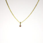 Kettenanhänger aus 18 Karat Gold mit pinkfarbenem Saphir